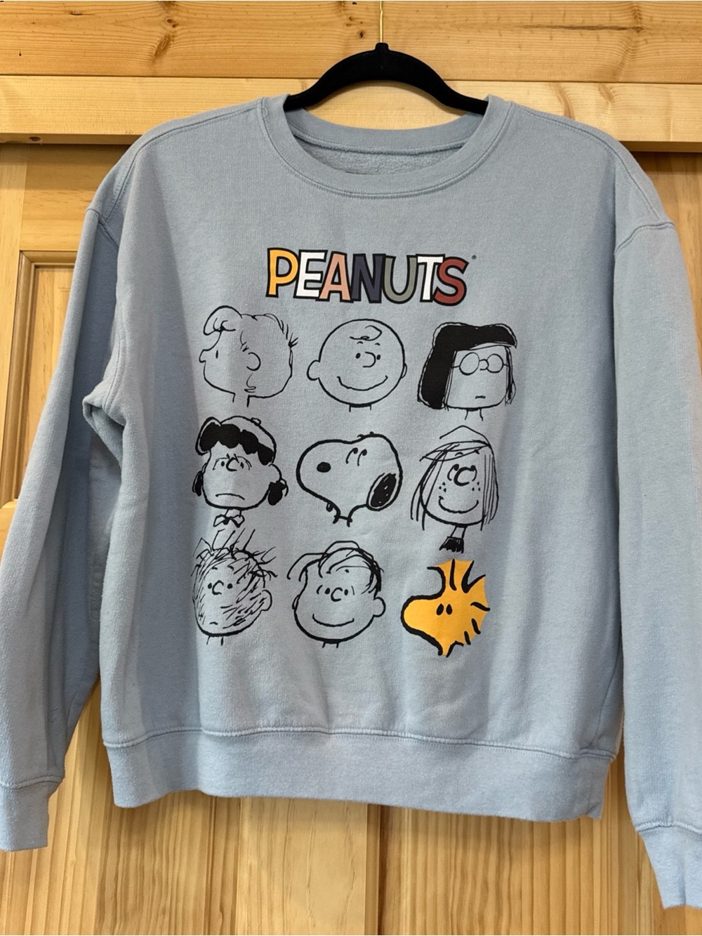 Peanuts Light Blue Women’s Sweatshirt with Multicolor Peanuts Logo Snoopy Woodst